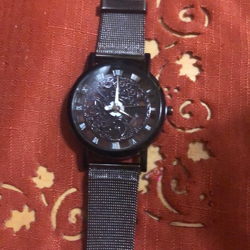 Very interesting black and pewter watch brand new